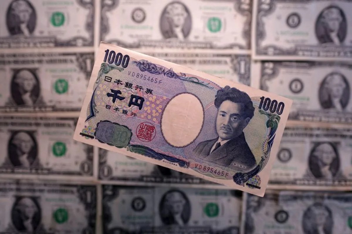 Dollar falls for second straight day but poised for weekly gain